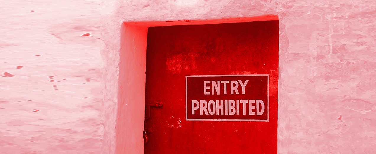 red door with entry prohibited written on it